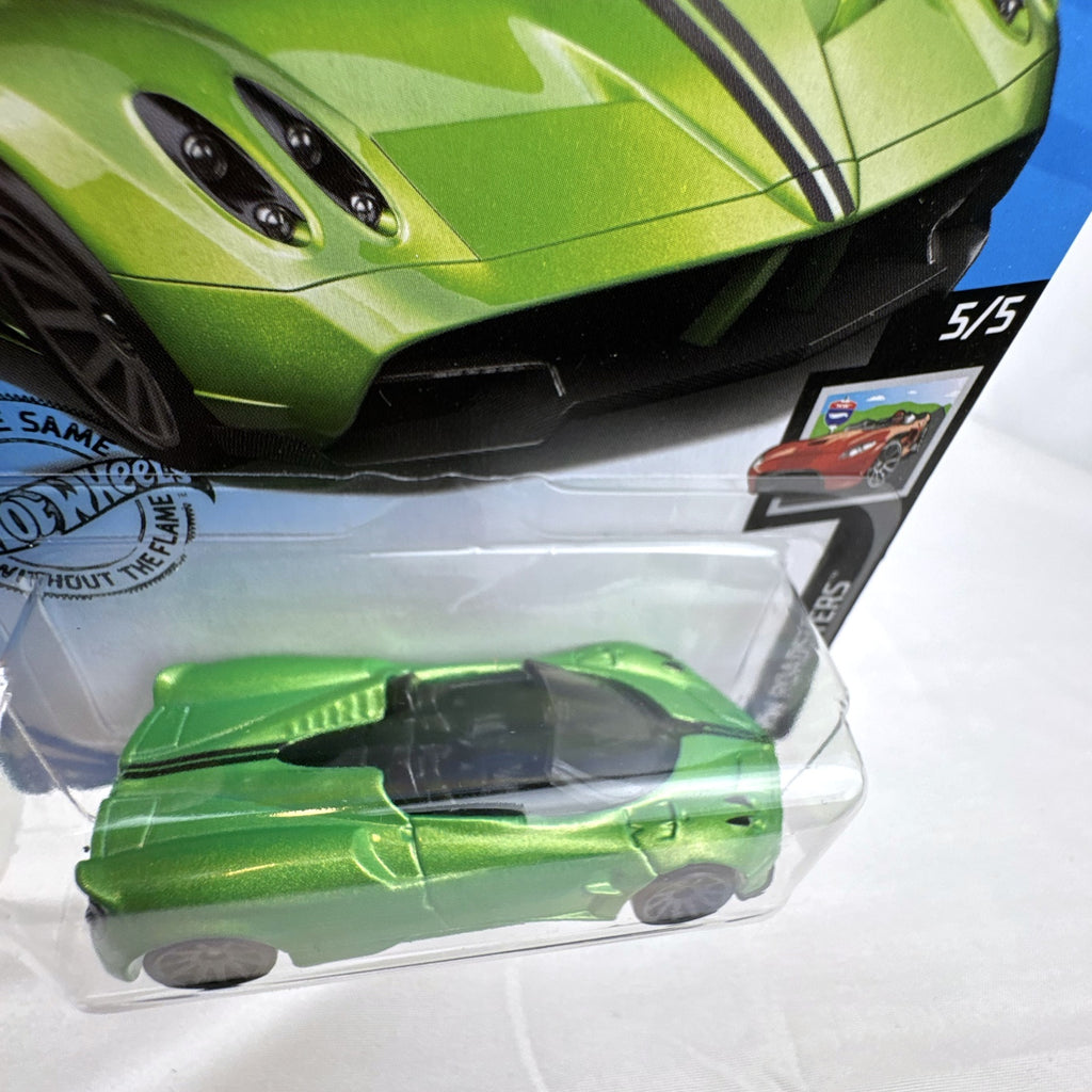 Sealed Hot Wheels 2017 Pagani Huayra Roadster 1:64 diecast car in metallic lime green on original blister card.