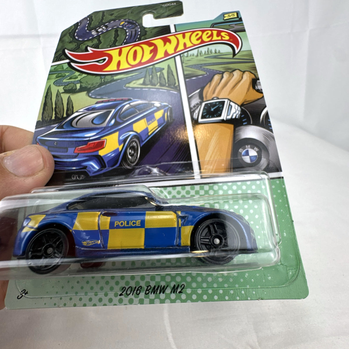Hot Wheels 1:64 scale 2016 BMW M2 diecast police car in blue UK Battenburg livery factory sealed on blister card