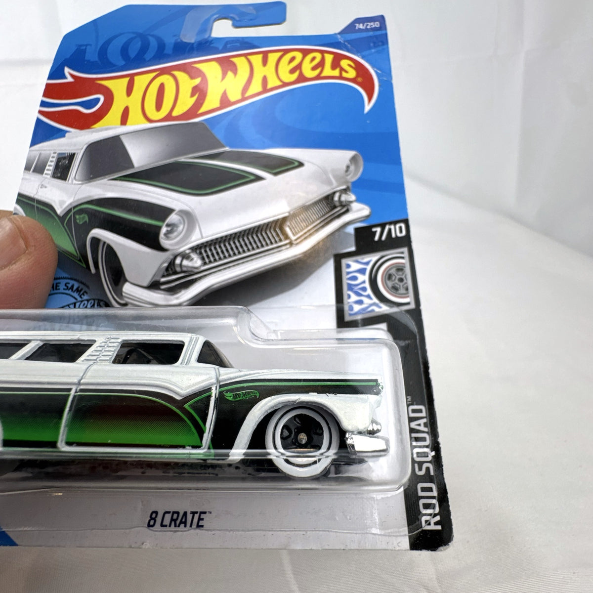 Hot Wheels 8 Crate custom station wagon in pearl white with green and black scallops on original unopened Rod Squad card.
