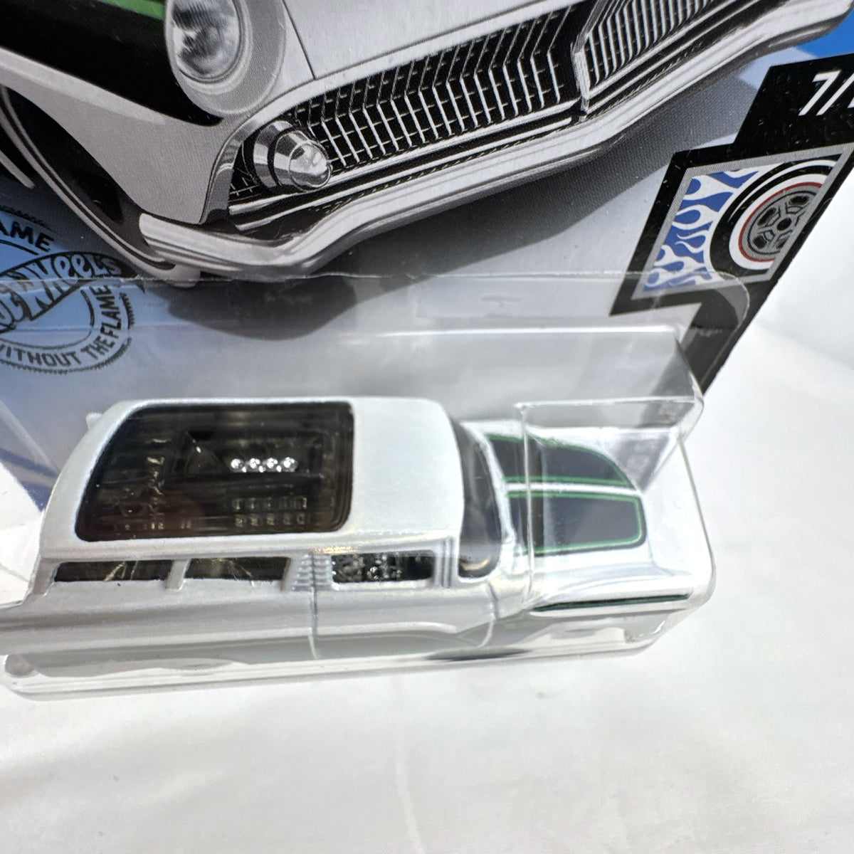 Hot Wheels 8 Crate custom station wagon in pearl white with green and black scallops on original unopened Rod Squad card.