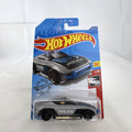 Hot Wheels 1:64 scale Alpha Pursuit police car diecast vehicle sealed on HW Rescue card packaging.