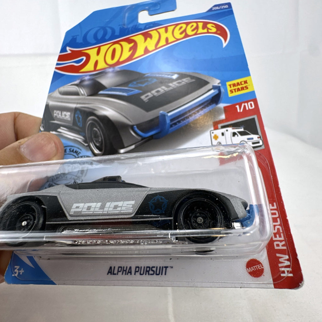 Hot Wheels 1:64 scale Alpha Pursuit police car diecast vehicle sealed on HW Rescue card packaging.