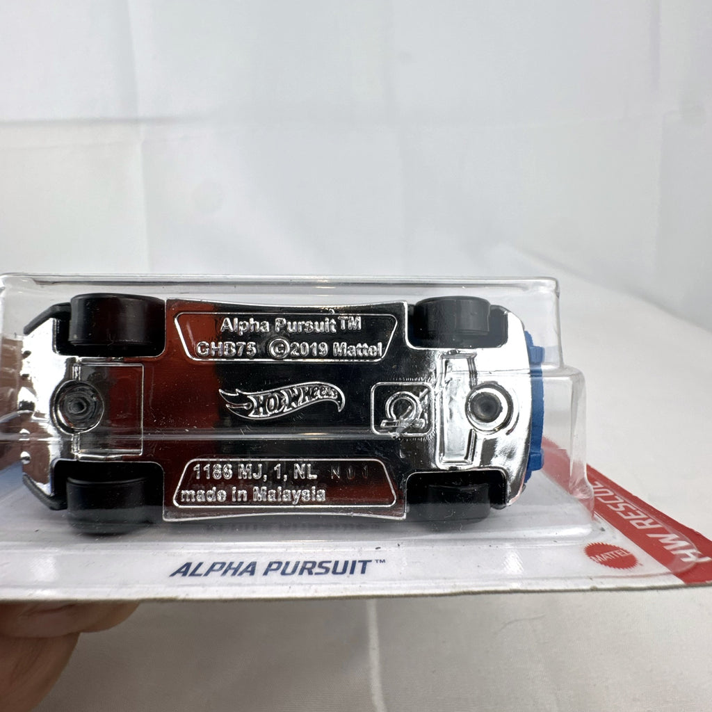 Hot Wheels 1:64 scale Alpha Pursuit police car diecast vehicle sealed on HW Rescue card packaging.