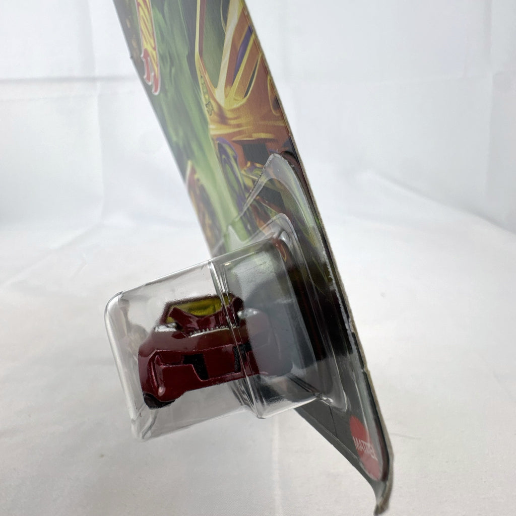 Hot Wheels 1:64 scale Twinduction Halloween Series metallic red diecast muscle car in original sealed packaging.