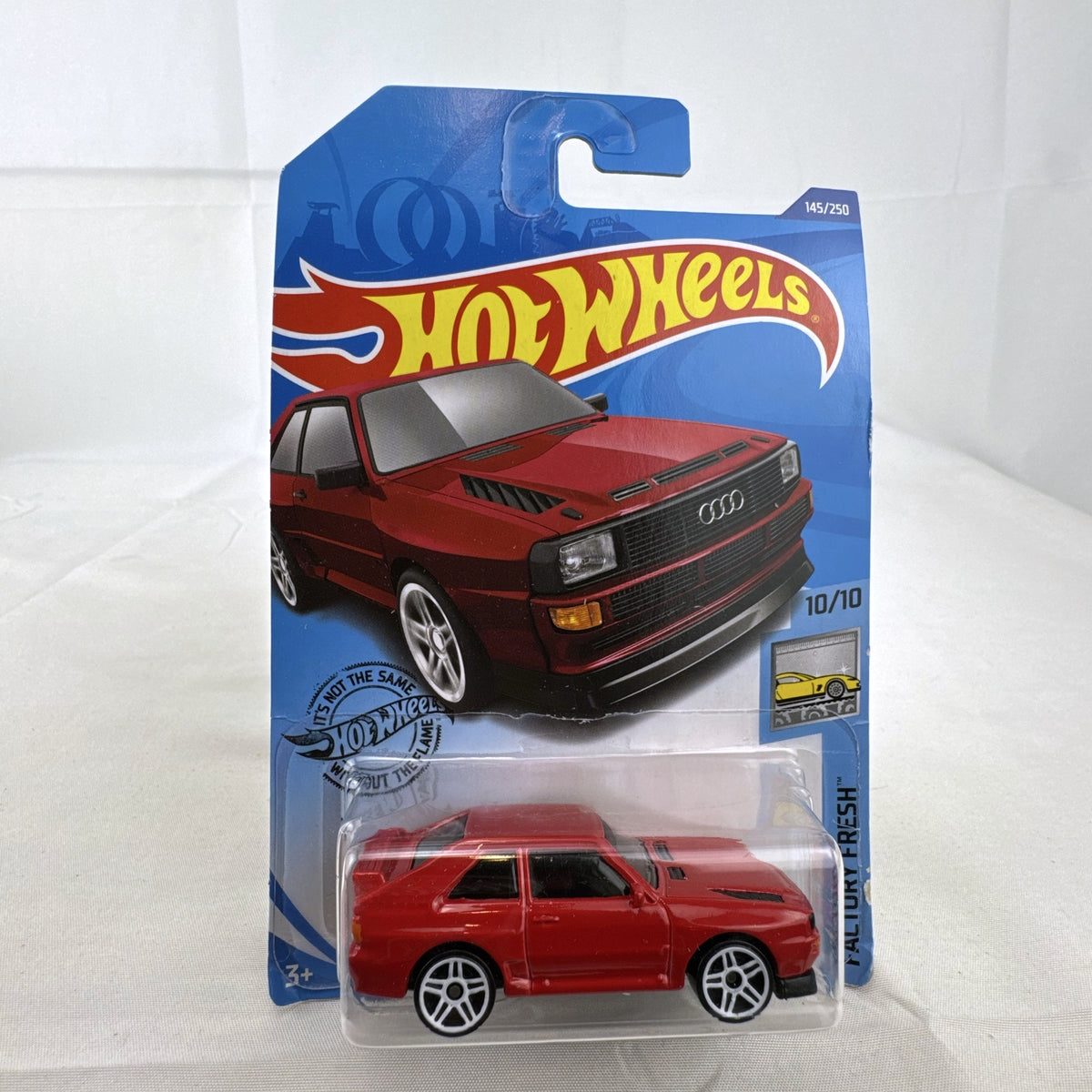 Hot Wheels 1:64 scale '84 Audi Sport Quattro diecast car in factory red sealed on original blister card.