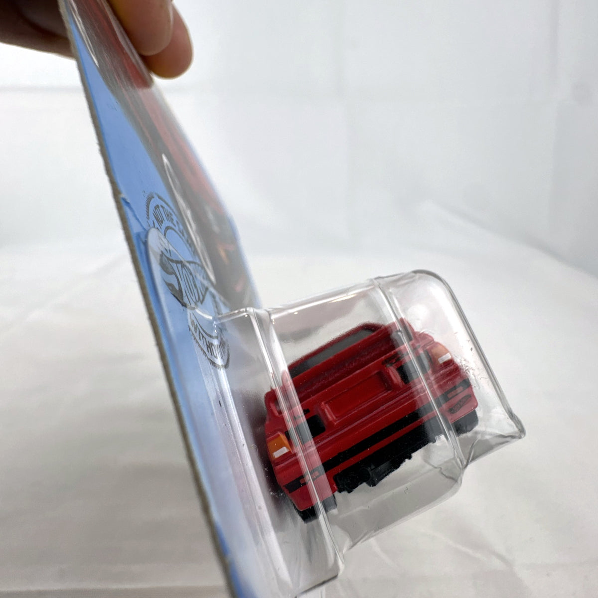Hot Wheels 1:64 scale '84 Audi Sport Quattro diecast car in factory red sealed on original blister card.