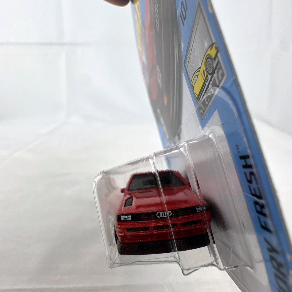 Hot Wheels 1:64 scale '84 Audi Sport Quattro diecast car in factory red sealed on original blister card.