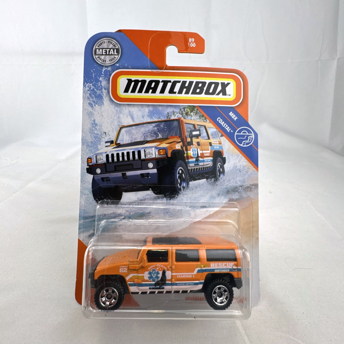 Matchbox 1:72 scale Hummer H2 SUV Concept diecast vehicle in orange MBX Coastal Marine Rescue graphics packaging.