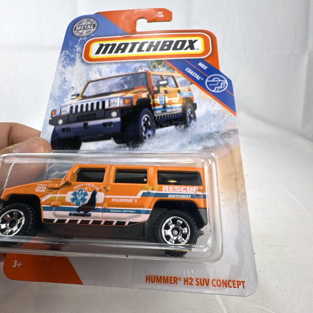 Matchbox 1:72 scale Hummer H2 SUV Concept diecast vehicle in orange MBX Coastal Marine Rescue graphics packaging.