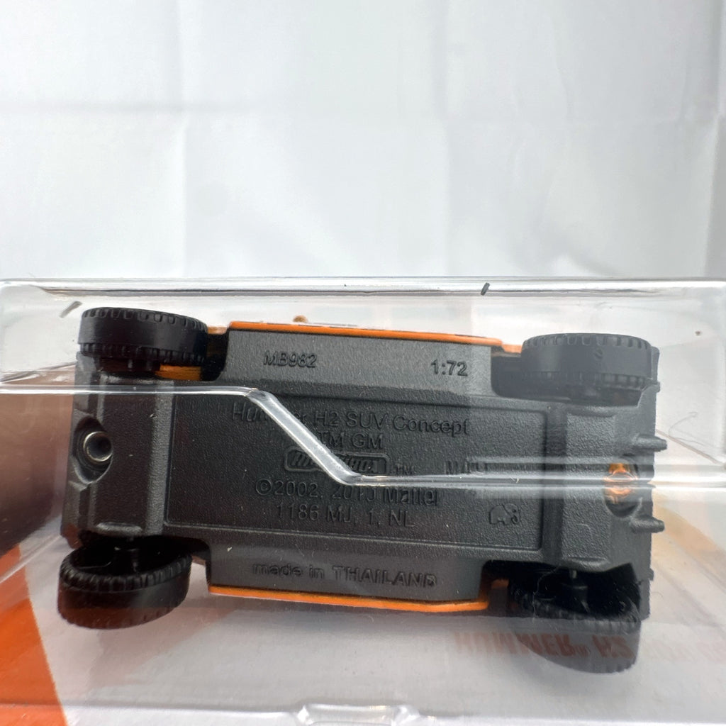 Matchbox 1:72 scale Hummer H2 SUV Concept diecast vehicle in orange MBX Coastal Marine Rescue graphics packaging.