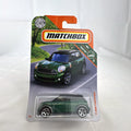 Matchbox 2011 MINI Cooper Countryman 1:64 scale diecast car in metallic green, factory sealed on card.
