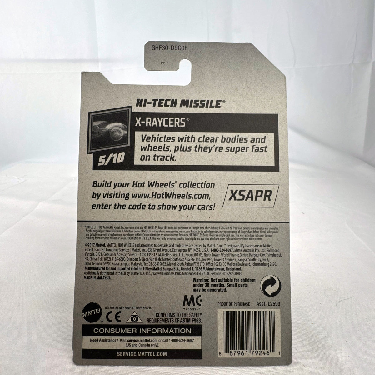 Hot Wheels 1:64 scale Hi-Tech Missile diecast car in translucent orange X-Raycers packaging.