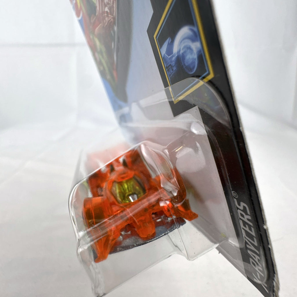 Hot Wheels 1:64 scale Hi-Tech Missile diecast car in translucent orange X-Raycers packaging.