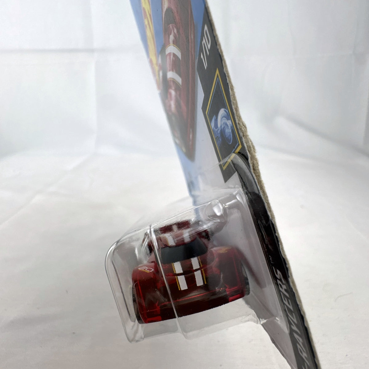 Hot Wheels Lindster Prototype 1:64 scale diecast car in translucent red sealed on original X-Raycers cardback