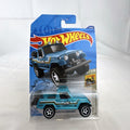Hot Wheels 1:64 1967 Jeepster Commando diecast truck in metallic blue from the Baja Blazers series