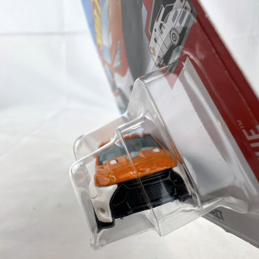 Hot Wheels 1:64 Ford Transit Connect Paramedic Van in orange and blue from the HW Rescue series sealed on card.