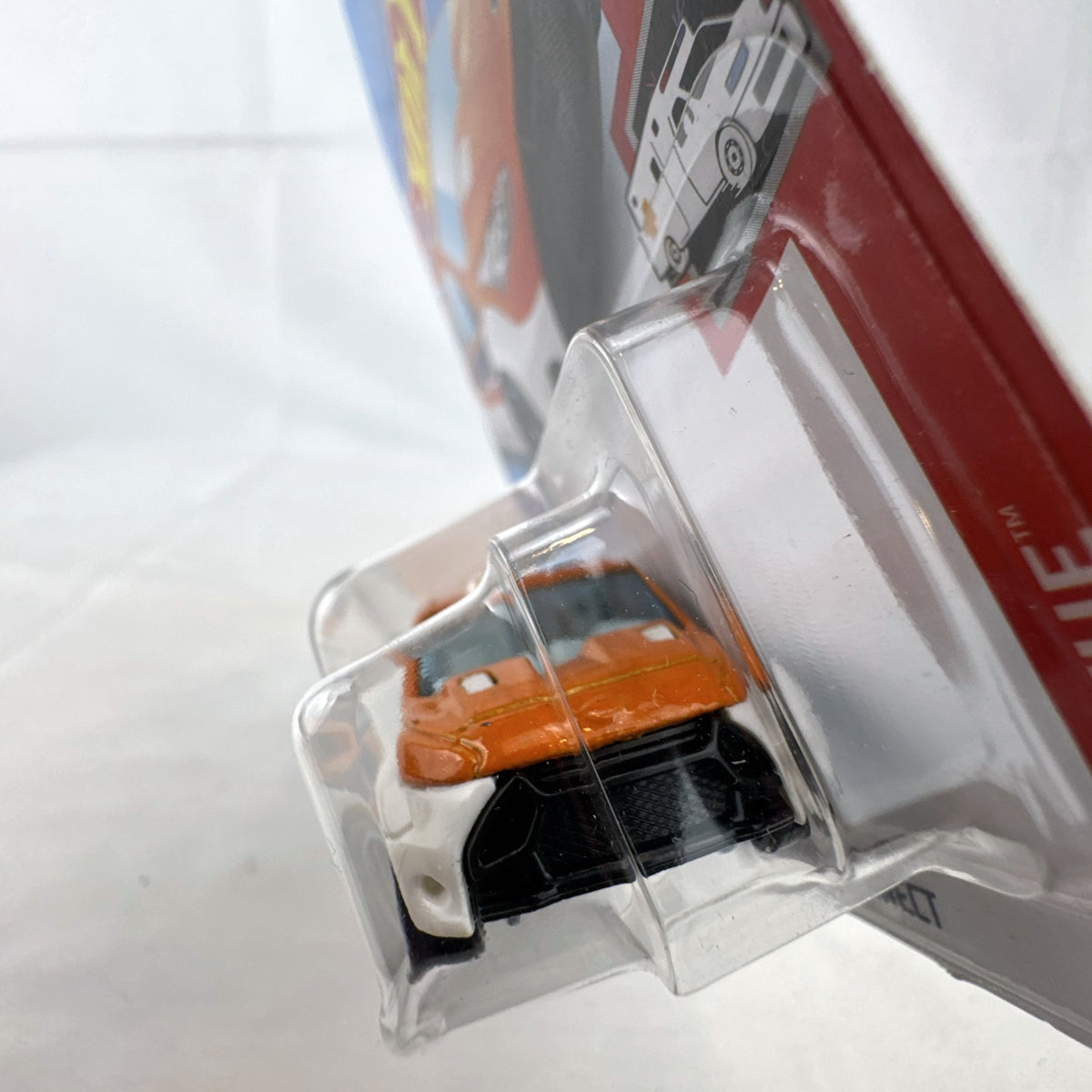 Hot Wheels 1:64 Ford Transit Connect Paramedic Van in orange and blue from the HW Rescue series sealed on card.