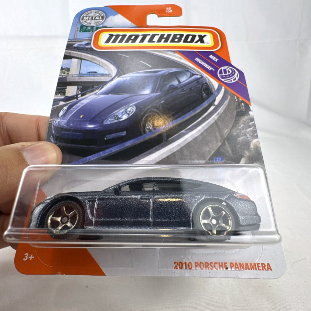 Matchbox MBX Highway 2010 Porsche Panamera diecast car in dark metallic gray on factory sealed card