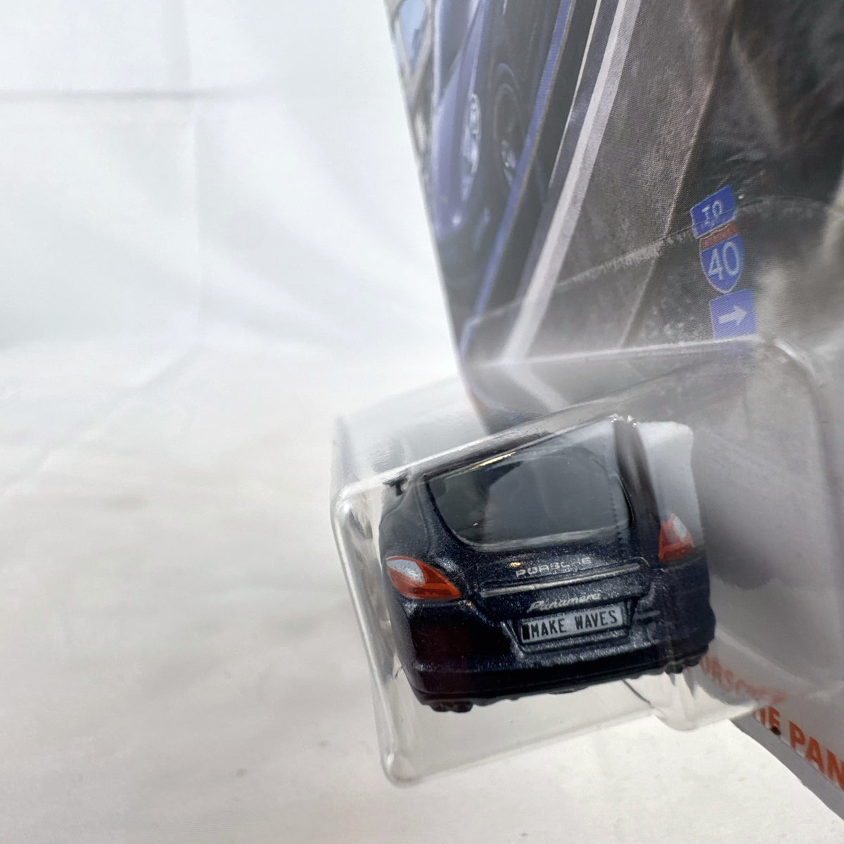 Matchbox MBX Highway 2010 Porsche Panamera diecast car in dark metallic gray on factory sealed card