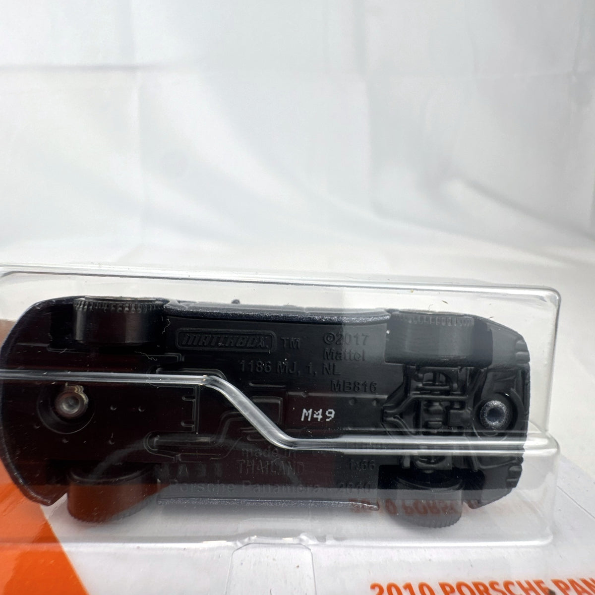 Matchbox MBX Highway 2010 Porsche Panamera diecast car in dark metallic gray on factory sealed card