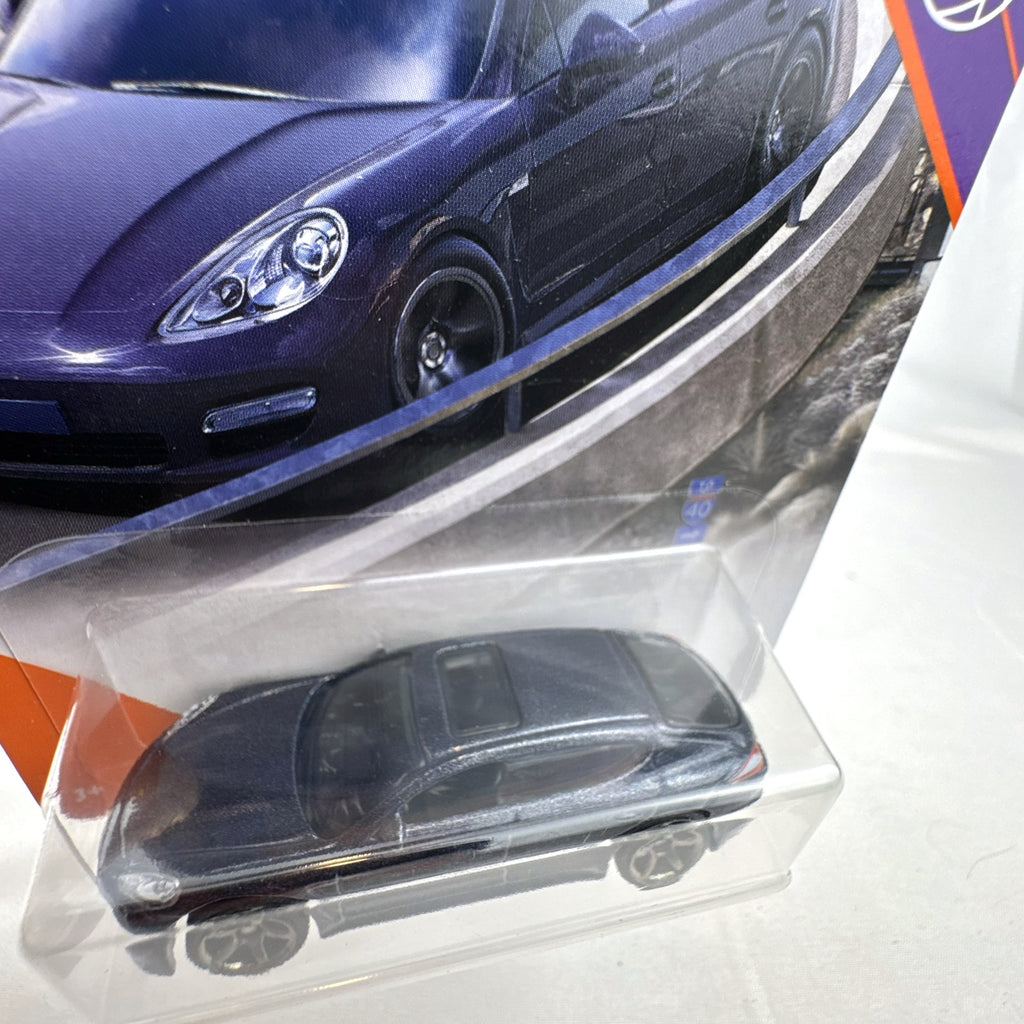 Matchbox MBX Highway 2010 Porsche Panamera diecast car in dark metallic gray on factory sealed card