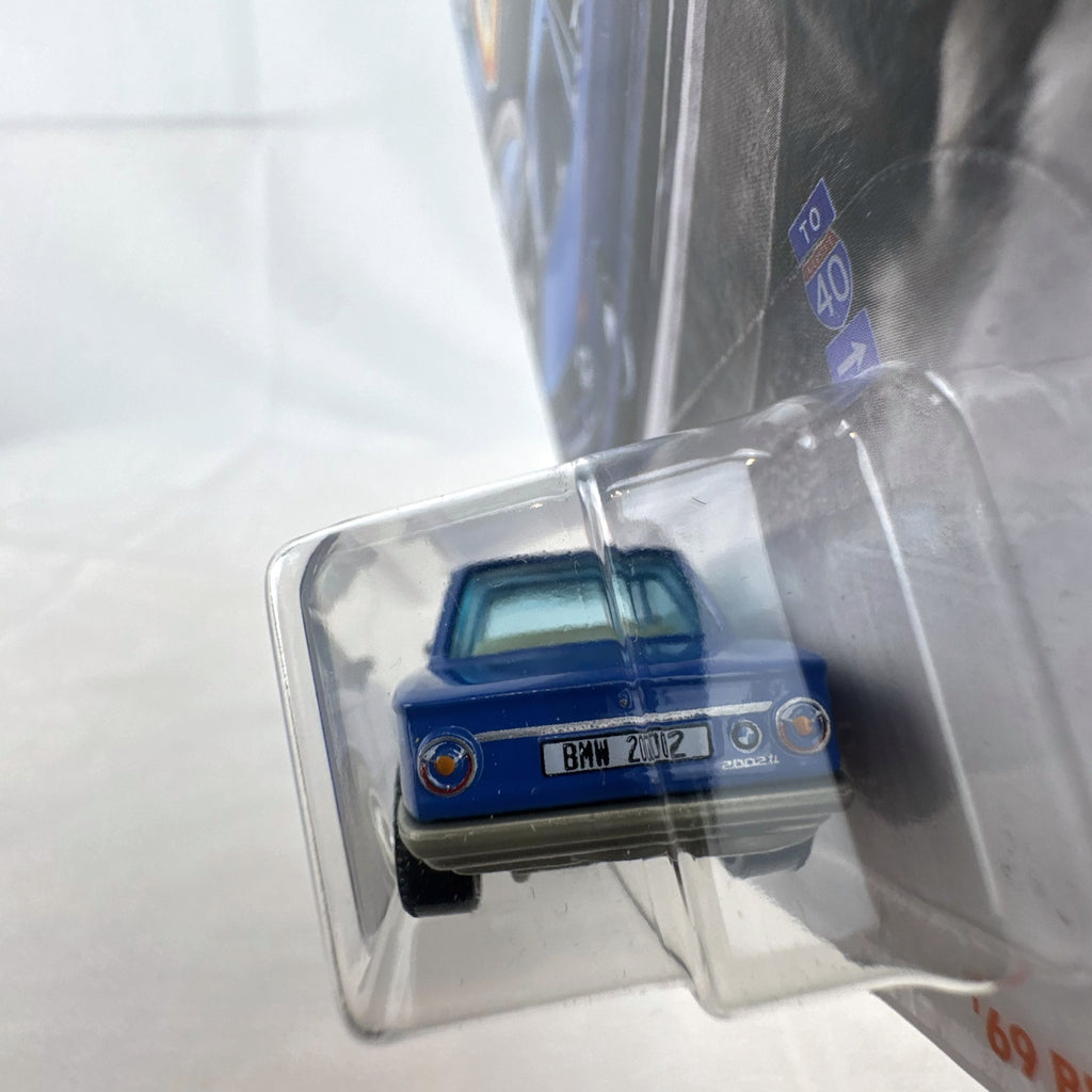 Matchbox 1:64 scale 1969 BMW 2002 diecast car in blue, factory sealed on MBX Highway blister card.