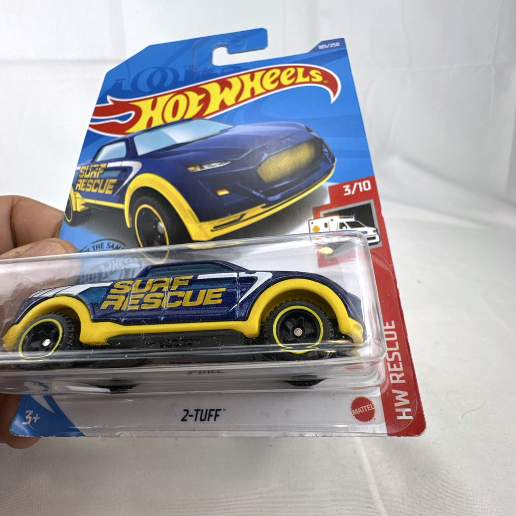 Hot Wheels 2-Tuff 1:64 scale diecast pickup truck in metallic blue HW Rescue card packaging