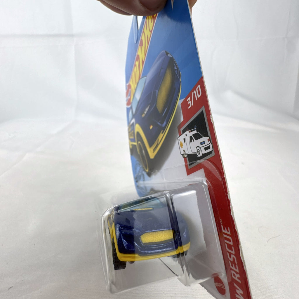 Hot Wheels 2-Tuff 1:64 scale diecast pickup truck in metallic blue HW Rescue card packaging