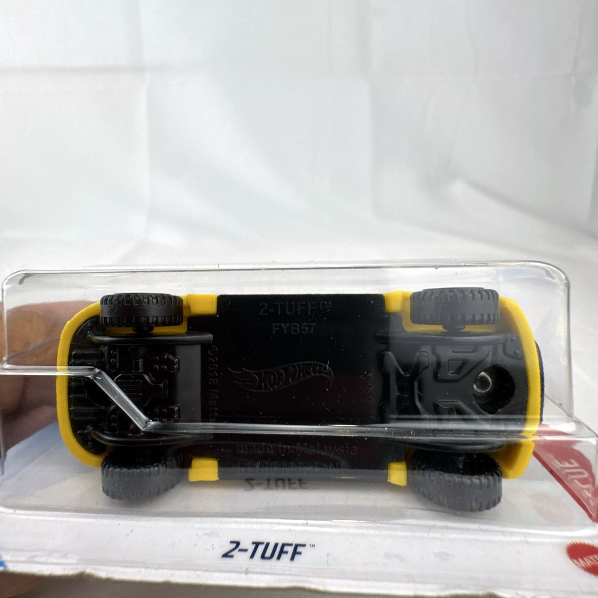 Hot Wheels 2-Tuff 1:64 scale diecast pickup truck in metallic blue HW Rescue card packaging