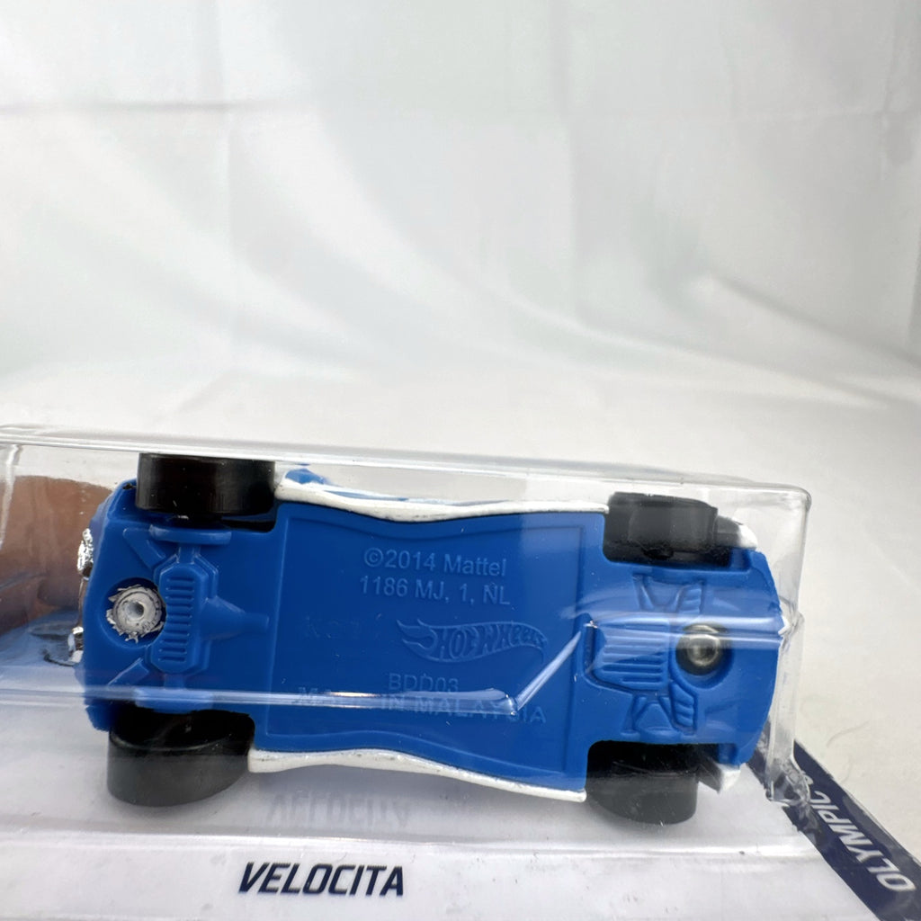 Hot Wheels 1:64 scale Velocita diecast car in white with Tokyo 2020 Olympic Swimming graphics, factory sealed.