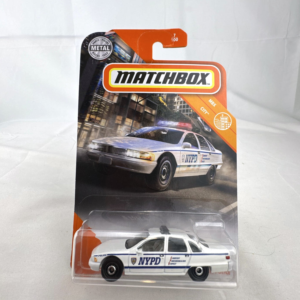 Sealed Matchbox 1:64 scale 1994 Chevrolet Caprice Classic NYPD Police diecast car in MBX City packaging