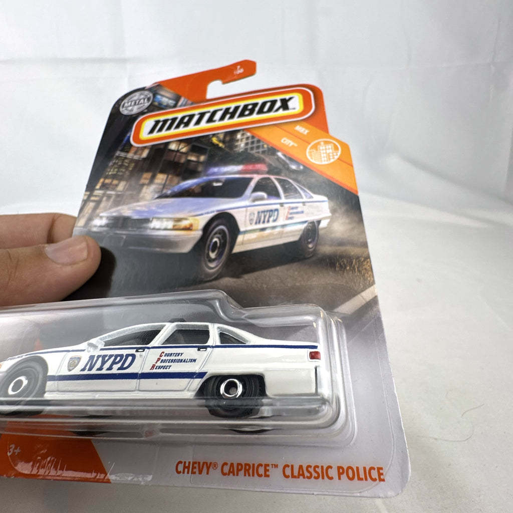 Sealed Matchbox 1:64 scale 1994 Chevrolet Caprice Classic NYPD Police diecast car in MBX City packaging