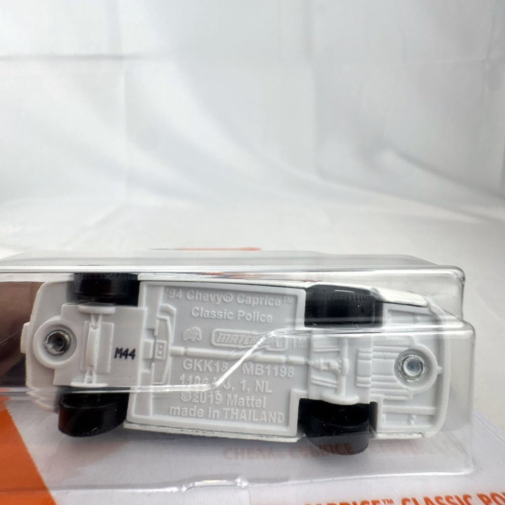 Sealed Matchbox 1:64 scale 1994 Chevrolet Caprice Classic NYPD Police diecast car in MBX City packaging