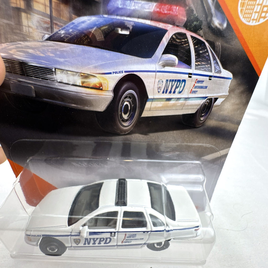 Sealed Matchbox 1:64 scale 1994 Chevrolet Caprice Classic NYPD Police diecast car in MBX City packaging