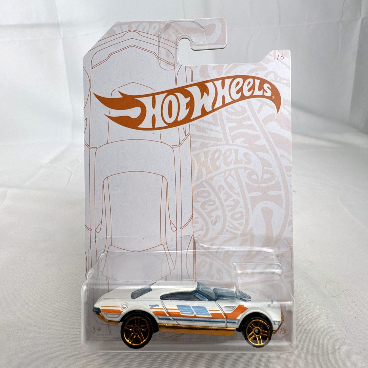 Hot Wheels Muscle Speeder 1:64 scale diecast car in Pearl and Chrome 52nd Anniversary packaging.