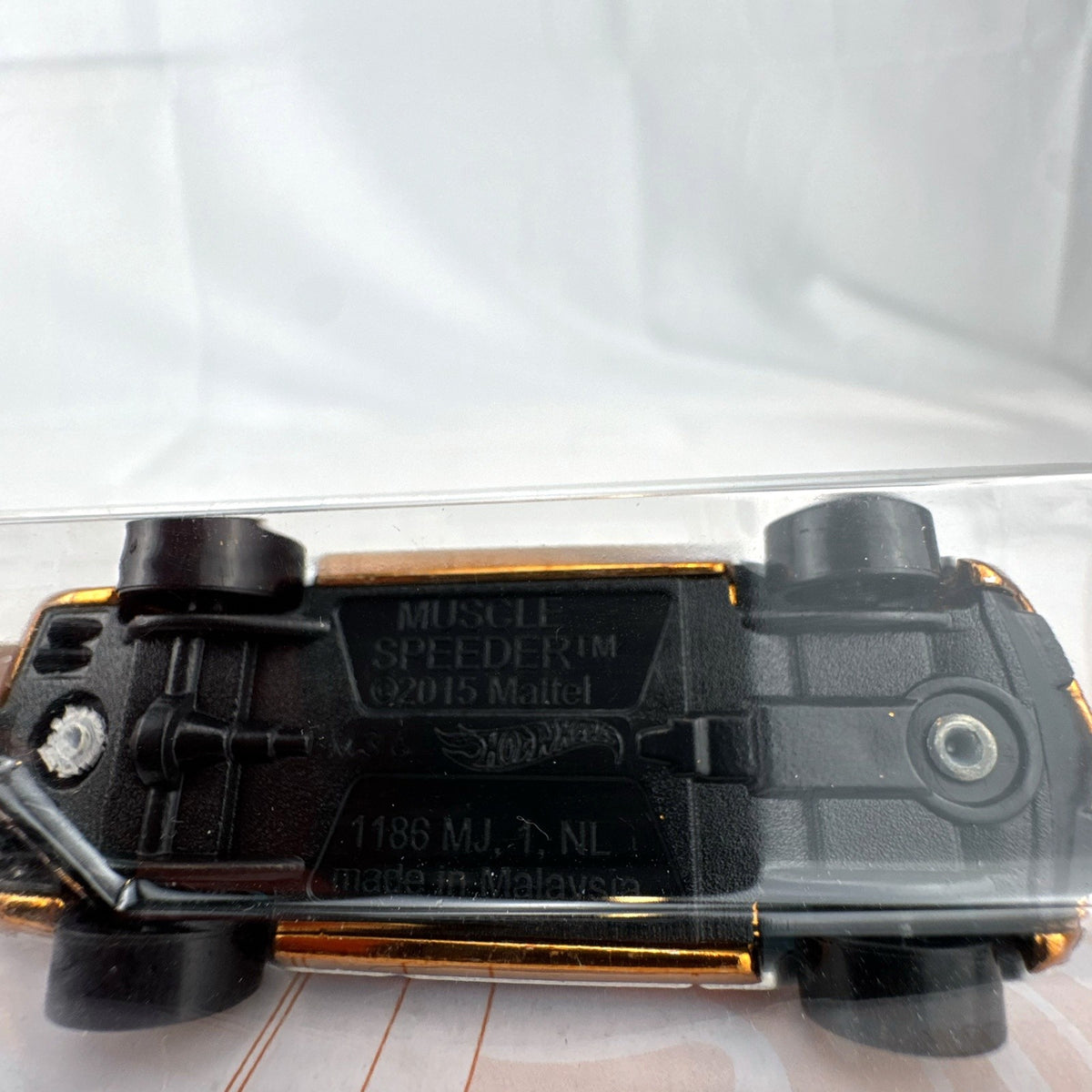 Hot Wheels Muscle Speeder 1:64 scale diecast car in Pearl and Chrome 52nd Anniversary packaging.