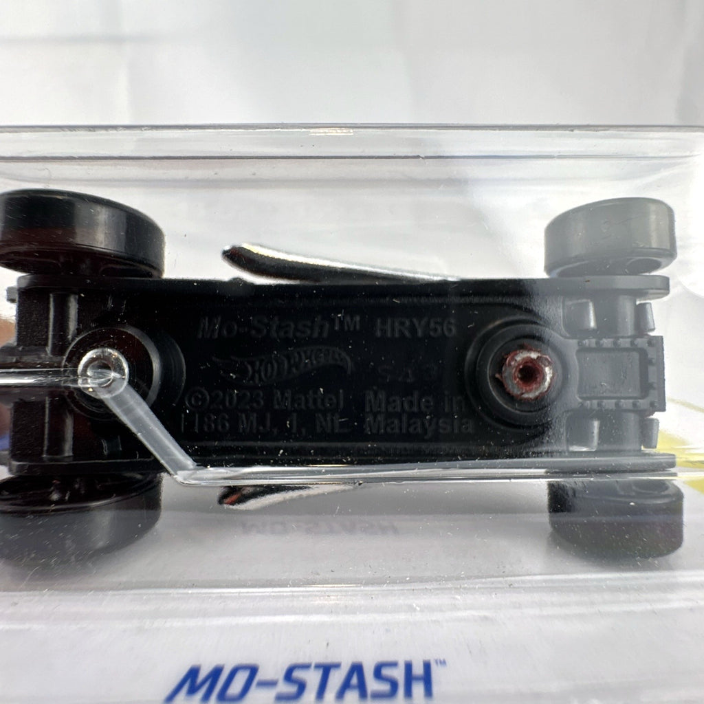 Hot Wheels Mo-Stash 1:64 diecast car in dark red with white graphics sealed on card from the 2024 Experimotors series