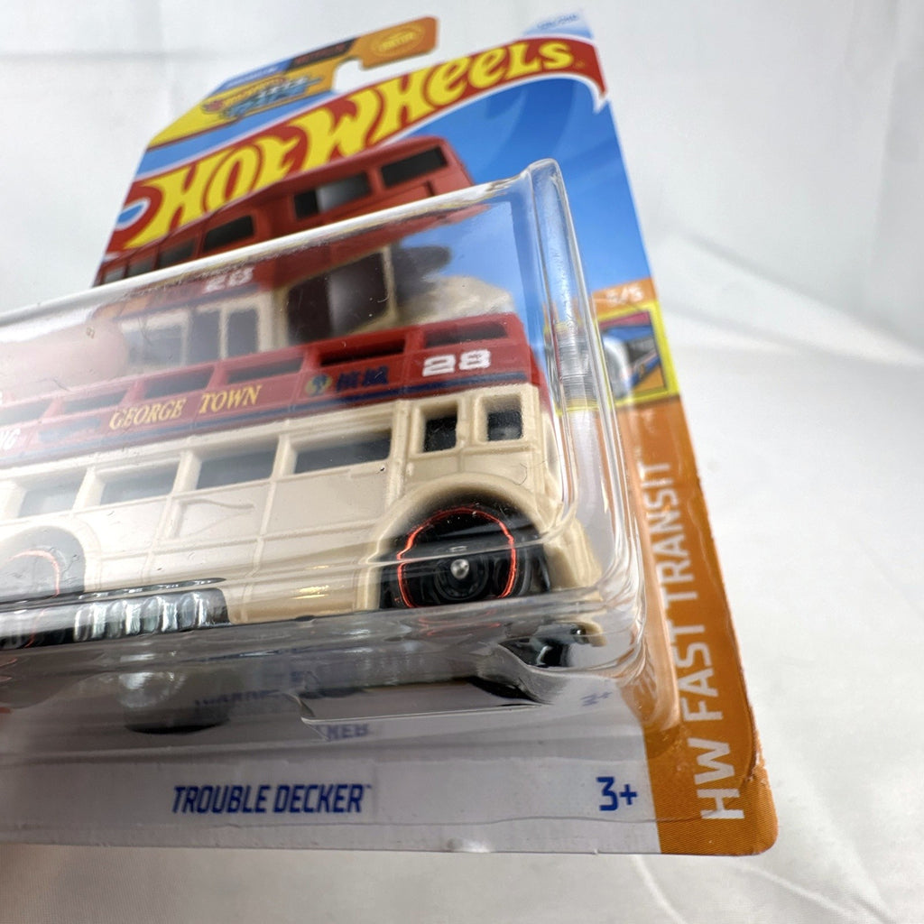 Hot Wheels Trouble Decker 1:64 scale diecast double decker bus in tan and red sealed in original package.