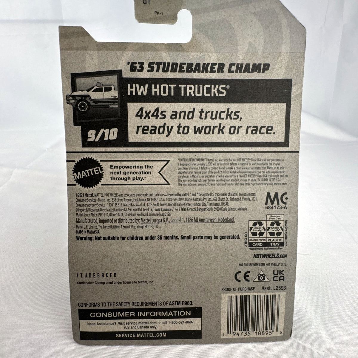 Hot Wheels 1:64 1963 Studebaker Champ diecast pickup truck in dark red metallic on original sealed card