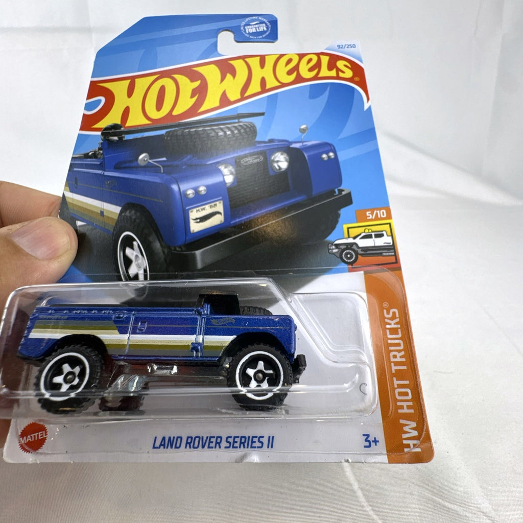 Hot Wheels 1:64 scale blue Land Rover Series II diecast truck factory sealed on original blister card