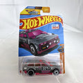 Hot Wheels Track Dwagon 1:64 scale diecast car in dark grey with pink graphics, factory sealed on card.