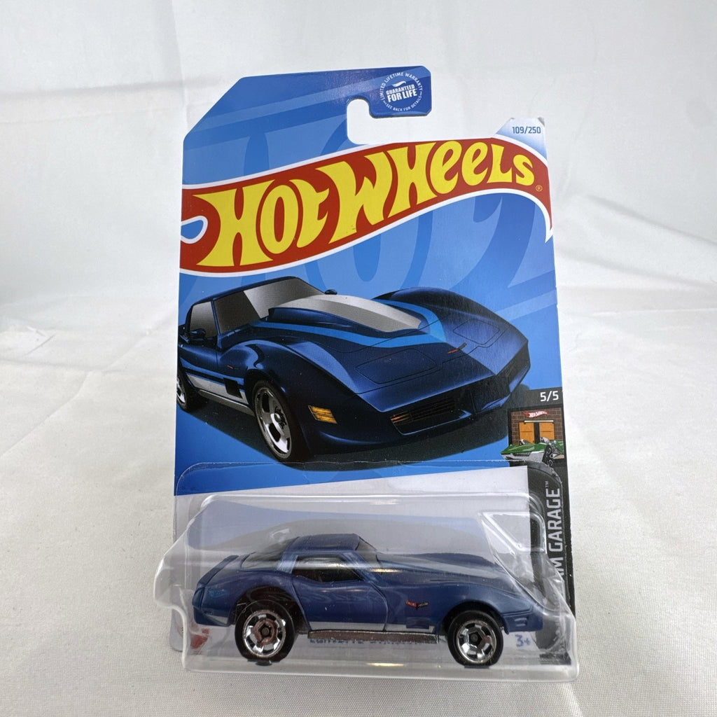 Hot Wheels 1:64 scale Chevrolet Corvette Stingray diecast car in blue on unopened blister card