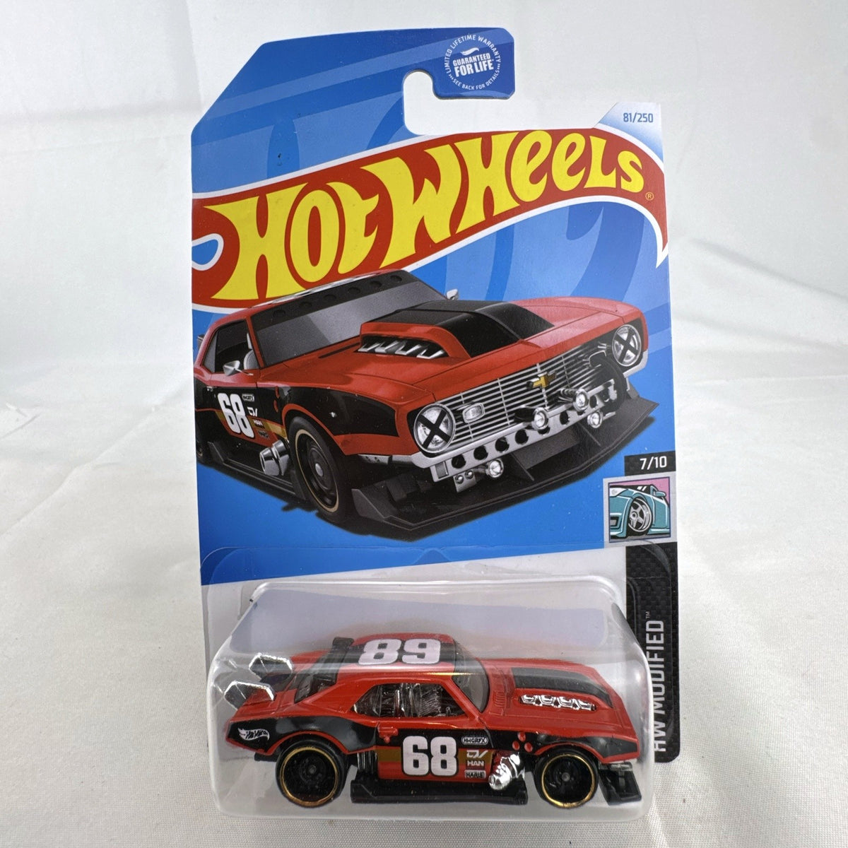 Hot Wheels Custom '68 Chevy Camaro diecast car in red and black livery, factory sealed on original card