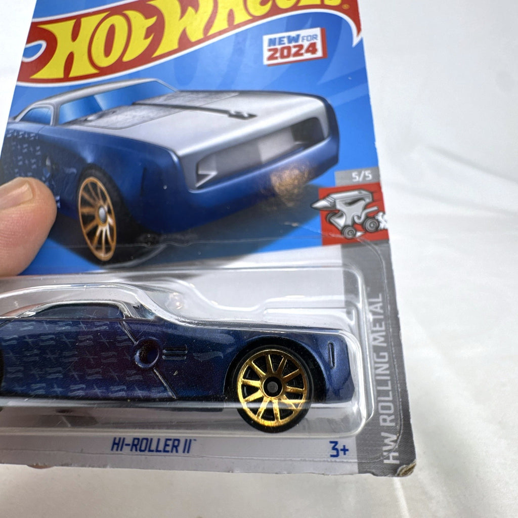 Hot Wheels 1:64 scale Hi-Roller II diecast car in metallic blue from the 2024 HW Rolling Metal series, factory sealed