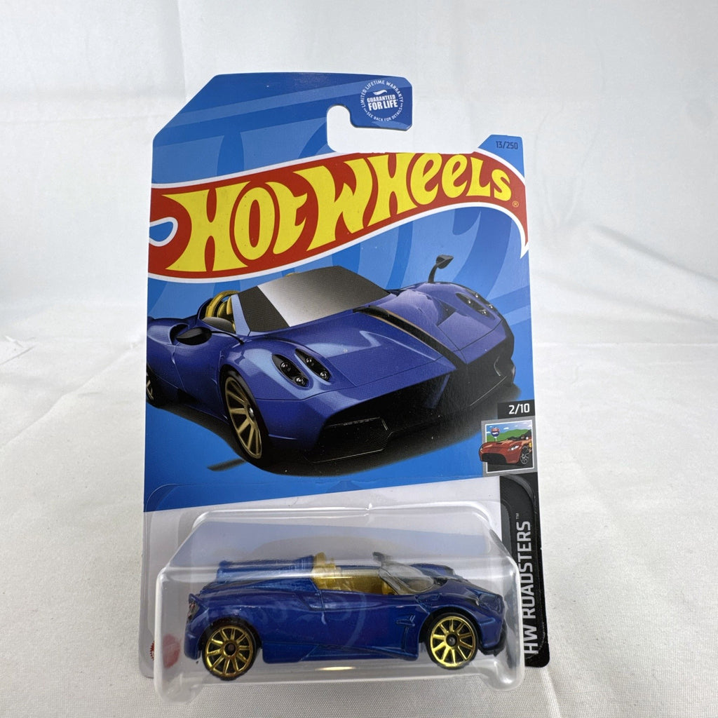 Hot Wheels 1:64 scale 2017 Pagani Huayra Roadster diecast car in blue sealed in original packaging.