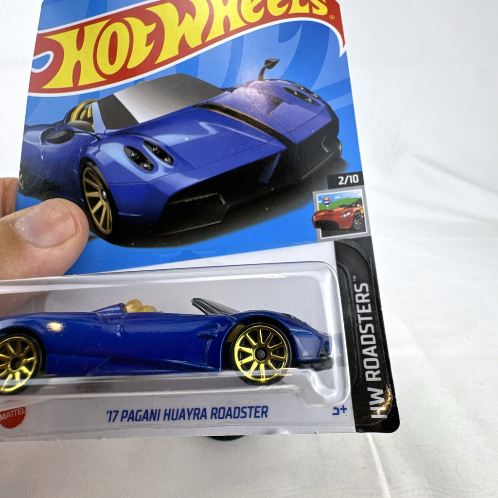 Hot Wheels 1:64 scale 2017 Pagani Huayra Roadster diecast car in blue sealed in original packaging.
