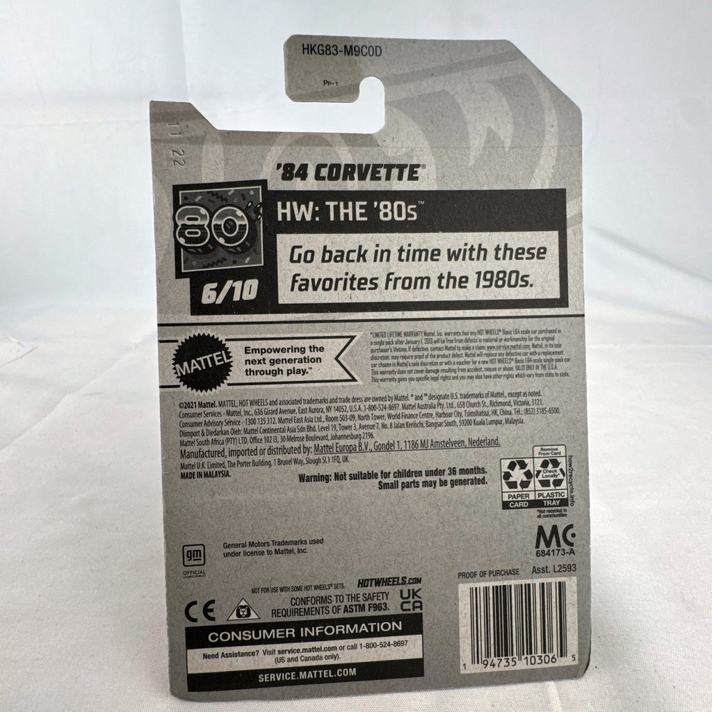 Hot Wheels 1:64 scale 1984 Chevrolet Corvette C4 diecast car in metallic gold sealed on original card packaging