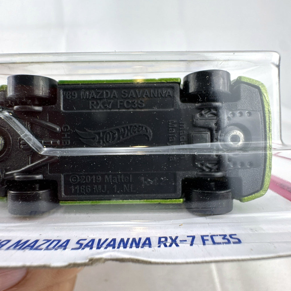 Hot Wheels '89 Mazda Savanna RX-7 FC3S 1:64 diecast car in metallic green on unopened card