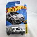 Hot Wheels 1:64 scale Ford Transit Connect diecast van from the HW Art Cars series in original packaging.