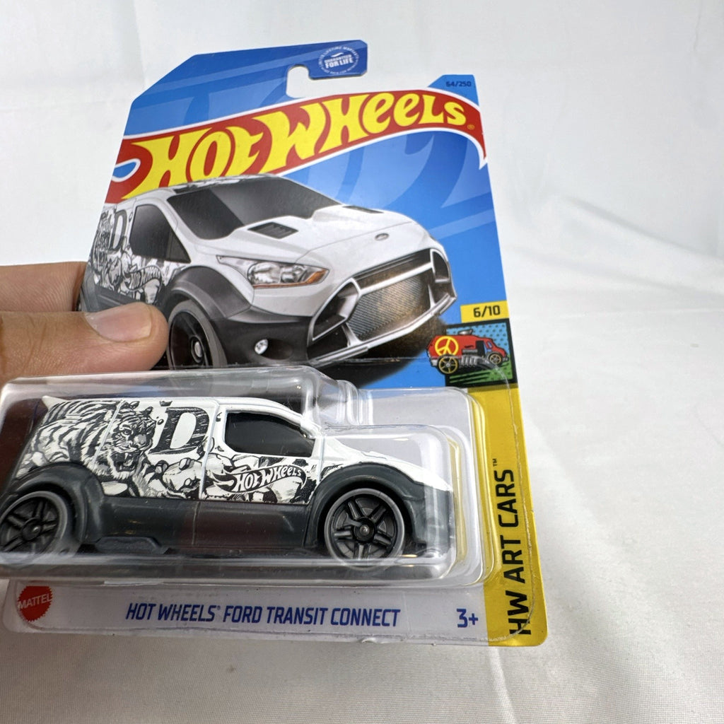 Hot Wheels 1:64 scale Ford Transit Connect diecast van from the HW Art Cars series in original packaging.